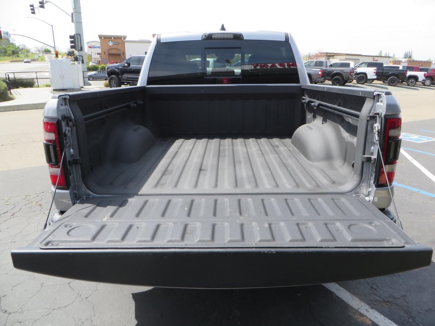 2021 SILVER /BLACK RAM 1500 TRX Crew Cab SB 4WD (1C6SRFU90MN) with an 6.2L V8 OHV 16V engine, 8A transmission, located at 2630 Grass Valley Highway, Auburn, CA, 95603, (530) 508-5100, 38.937893, -121.095482 - Photo#9